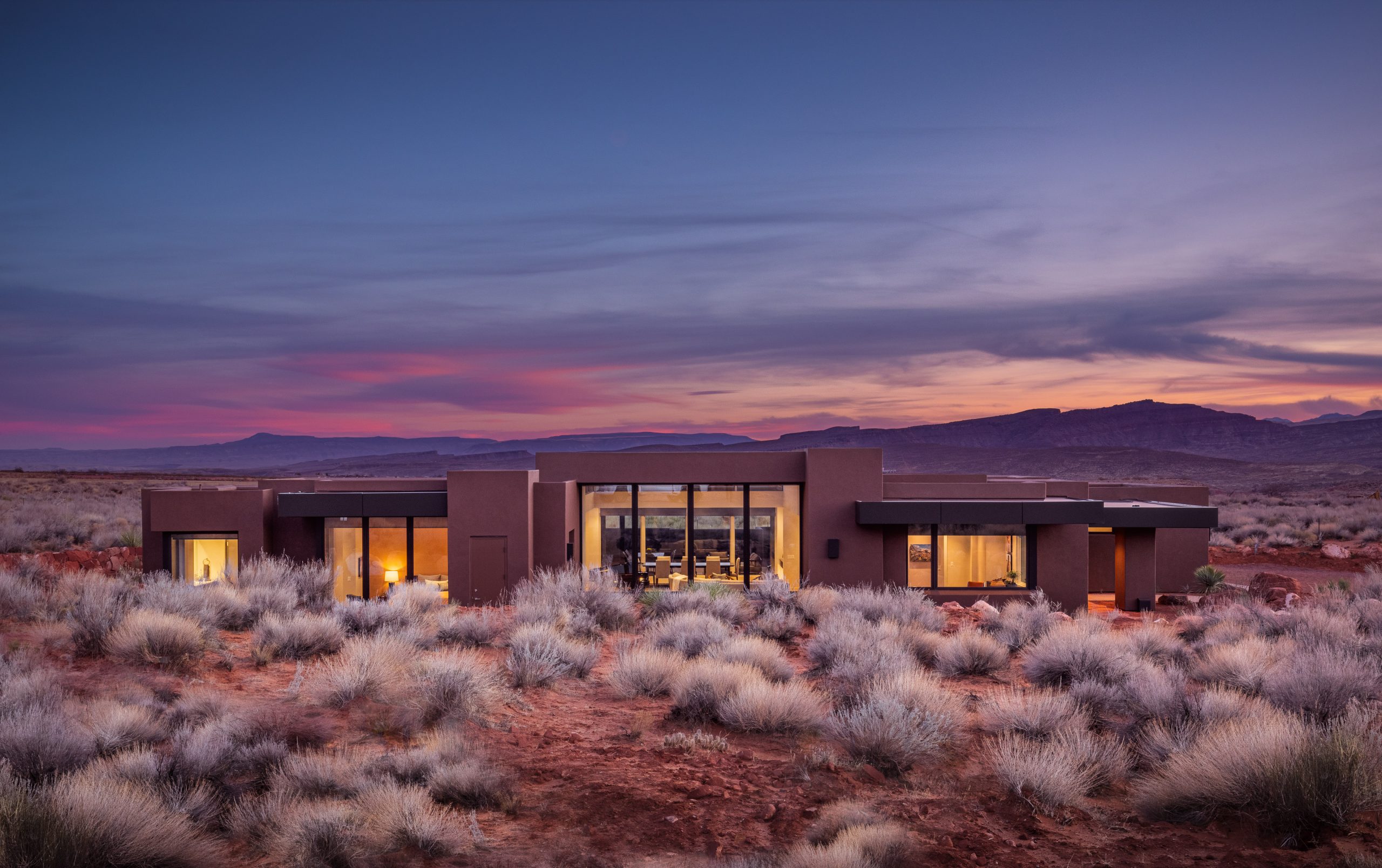 Kayenta Home Surrounded by Red Mountains
